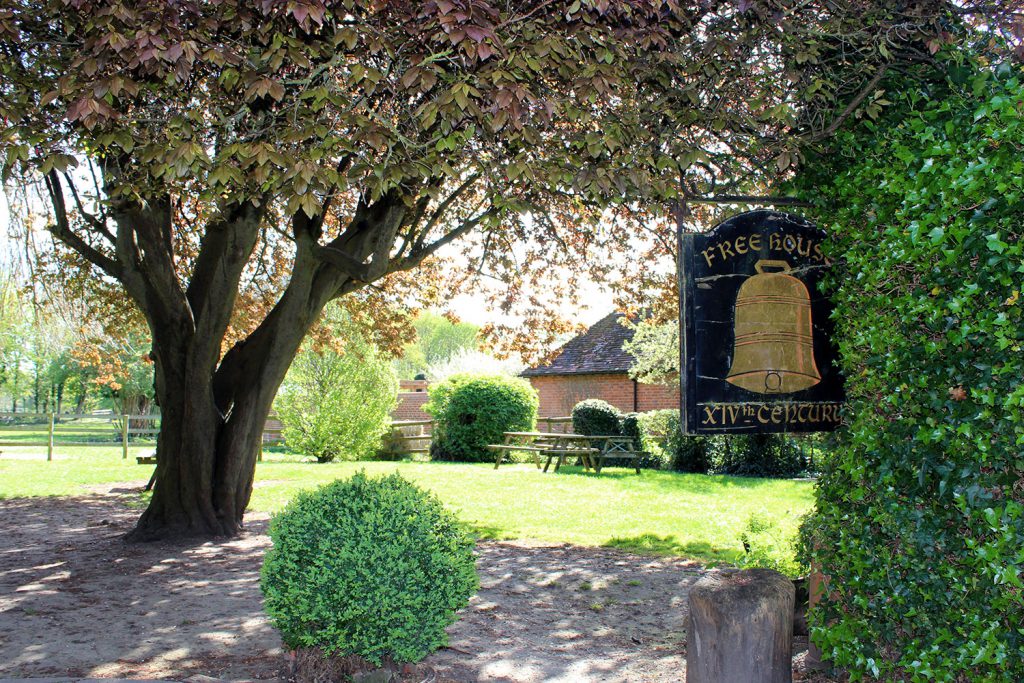 The Bell - garden view with sign